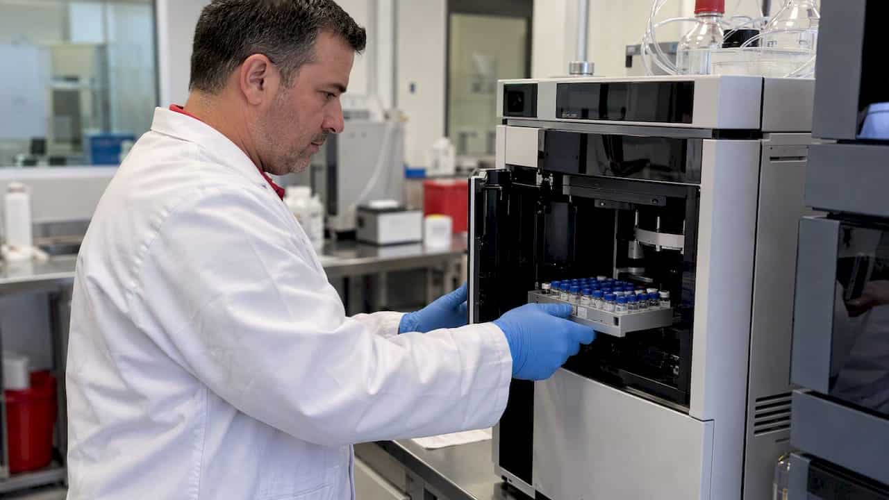 Scientist preparing LC-MS/MS confirmation